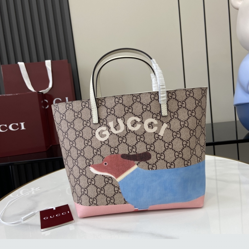 G*u*i shopping bags
